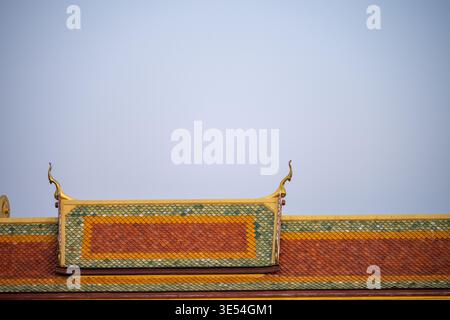 Bangkok Thailand February 1 2026. Large Buddha statue framed by decorative arch with full moon visible in background sky. Stock Photo