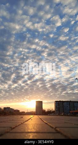 Blue sky with white puffy clouds, beautiful sky background texture. Clean air and clouds. Stock Photo