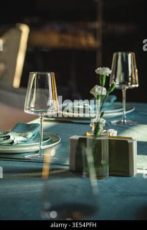 Elegant restaurant table setting with glassware Stock Photo