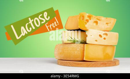 Lactose free cheese displayed on a wooden board with green background Stock Photo