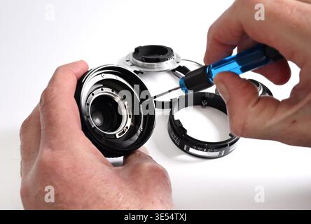 Exploded view of camera lens repair Stock Photo