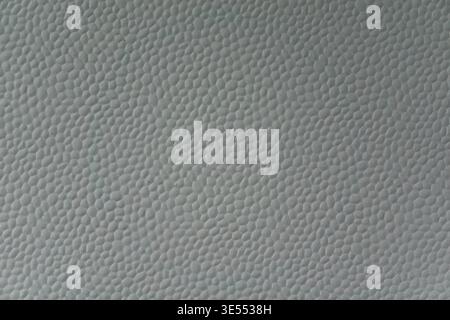 Close up of white polystyrene foam with porous cellular structure. Lightweight material texture with abstract pattern and detailed macro surface. Stock Photo