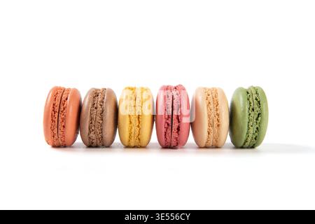Assorted sweet macarons presenting different flavors in a row Stock Photo