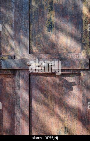 Rustic iron door and beautiful colors. Stock Photo