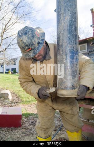 Digging a water well, Pennsylvania, USA Stock Photo