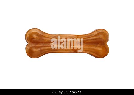 Single rawhide dog bone treat isolated on a white background, ideal for pet care, training, and animal nutrition concepts. Stock Photo