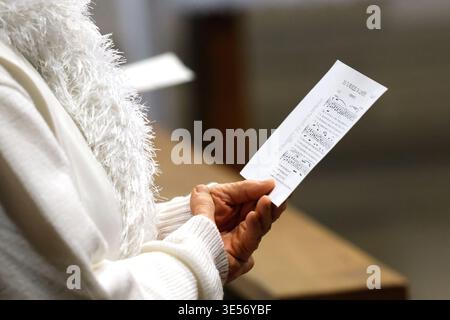 Dominican convent of Monteils. Detail of a nun holding musical score with handwritten notes during a monastic choral prayer.; Monteils.  France. Stock Photo