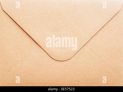 Brown kraft paper envelope texture close up, background. Stock Photo
