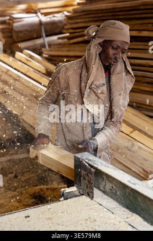 Worker in a carpentry workshop in Kigali, Rwanda Stock Photo