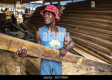 Worker in a carpentry workshop in Kigali, Rwanda Stock Photo