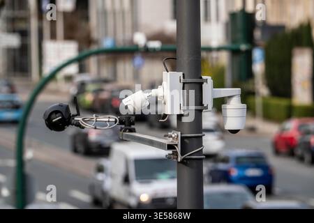 Video cameras from FLIR and Vivotek at a large, busy traffic light junction, Alfredstraße, B224 and Martinstraße, in Essen; they measure traffic flow Stock Photo