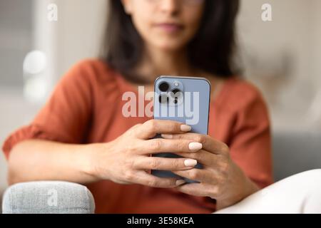 Close up cropped image of female using modern smartphone Stock Photo