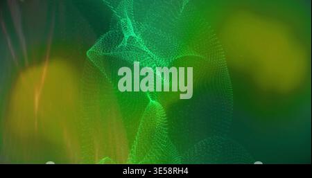 Flowing central green particle mesh forming waves in digital wallpaper, with dots, bokeh, streaks Stock Photo