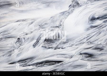 View of shapes like a painting on the sands of the beach of Skagsanden in winter. Skagsanden beach, Flakstad, Lofoten Islands, Norway, Europe. Stock Photo