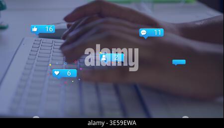 Typing woman's hands tapping keys on white laptop keyboard at desk, with blue social notifications Stock Photo