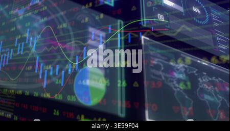Displaying overlaid financial dashboards across trading desk glass, showing HUD charts and tickers Stock Photo