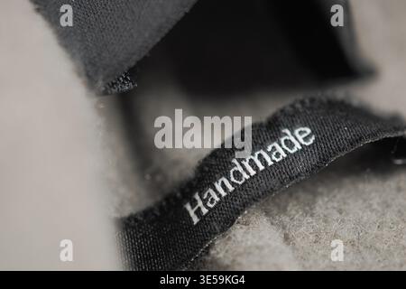Close-up view of a handmade label on a textile item Stock Photo