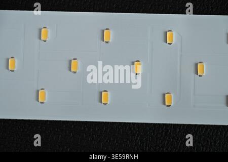 LED printed circuit board (PCB) module, a core component in modern energy-efficient lighting solutions. Stock Photo