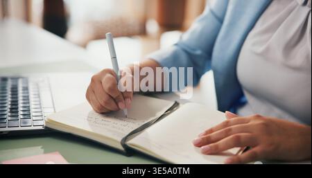 Woman, hands and writing with book for business schedule, project deadline or reminder in office. Female person, employee or taking notes with Stock Photo