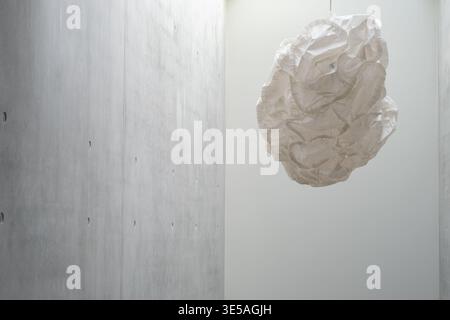 Hanging crumpled paper object minimal abstract interior design concept Stock Photo