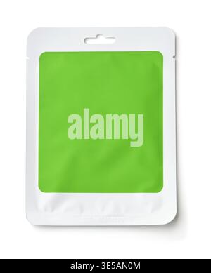 Front view of foil cosmetics sachet with blank green label isolated on white Stock Photo