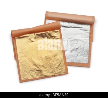 Top view of natural edible food gold and silver leaf sheets isolated on white Stock Photo