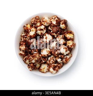 Top view of chocolate popcorn in ceramic bowl isolated on white Stock Photo