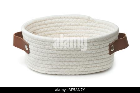 Decorative white cotton rope coiled basket with handles isolated on white Stock Photo