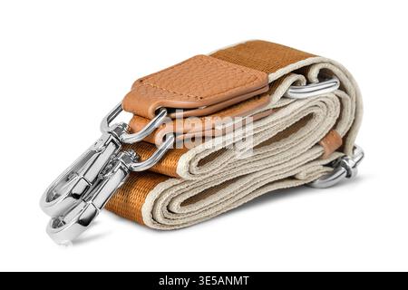 Folded brown fabric and leather bag strap isolated on white background Stock Photo