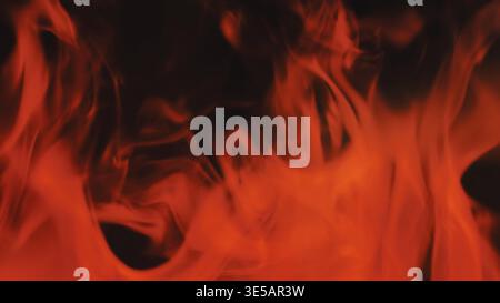Red flames flickering creating a warm dangerous abstract background with glowing heat Stock Photo