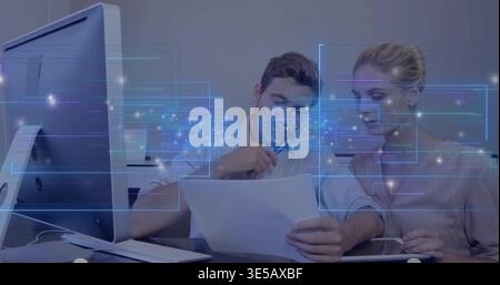Reading man and woman analysts examining paper at office, wearing business shirts with holograms Stock Photo