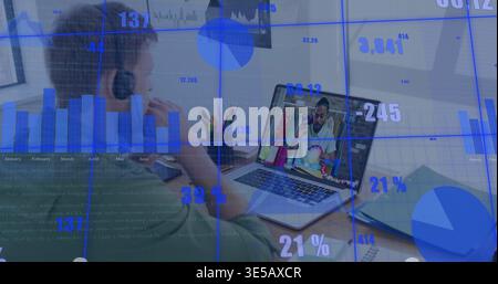 Listening man in green shirt and headset engaging at home with remote call on laptop, analytics Stock Photo