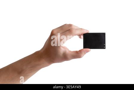 Hand holding smartphone battery isolated on white background, ideal for concepts of mobile power, replacement parts, and electronic components Stock Photo