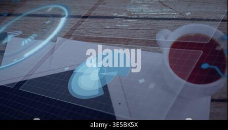 Projecting holographic circular interface hovering above tablet at wooden desk, papers and cup Stock Photo