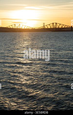 Sunset at the Forth Bridges seen from Dalgety Bay, Fife, Scotland Stock Photo