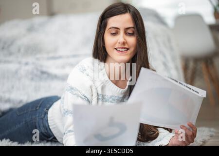 Young woman studying learning working from home Stock Photo