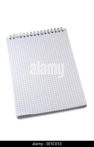 Checkered notepad with metal spiral binding at the top, for taking notes at school or the office, isolated on white  with clipping path included Stock Photo