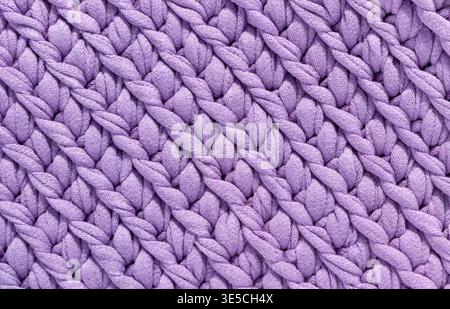 Cable knitting pattern in seamless color pattern.  Knit background with ornament. Knitted texture. Stock Photo