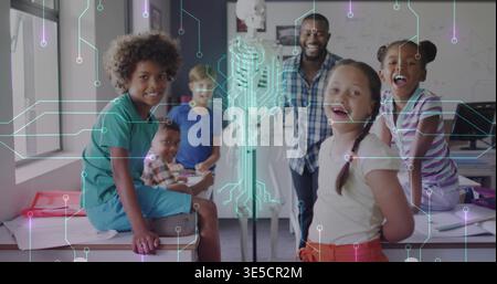 Teaching teacher in plaid shirt guiding five children in STEM lab, skeleton and circuit graphics Stock Photo