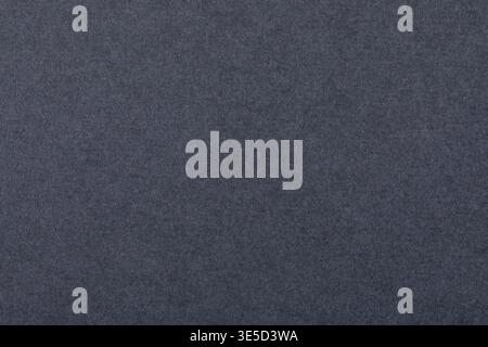 Seamless dark gray felt fabric texture, ideal for backgrounds, presentations, web design, and product mockups with a modern, neutral look. Stock Photo