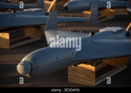 Undisclosed Location, United States. 23 November, 2025. LUCAS or Low-cost Unmanned Combat Attack System drones are positioned on the tarmac at a base in the U.S. Central Command operating area, November 23, 2025 at an Undisclosed Location. The LUCAS drone was developed by SpektreWorks by reverse engineering the Iranian HESA Shahed 136 drone.Credit: Handout/U.S Air Force Photo/Alamy Live News Stock Photo