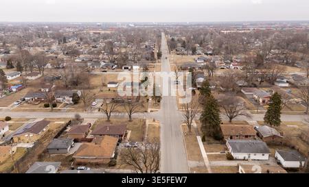 Drone shot of a long straight suburban road Stock Photo
