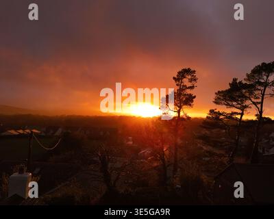 Flintshire, Wales. UK Weather: 1st April 2026, stunning sunset over the rural village of Lixwm in North Wales as the winds and rain begin to come in from the west. Lixwm, Flintshire, North Wales.  ©DGDImages/Ģ����ý Live News Stock Photo