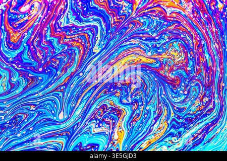 Close up on a soap bubble with random abstract forms and colors for background Stock Photo