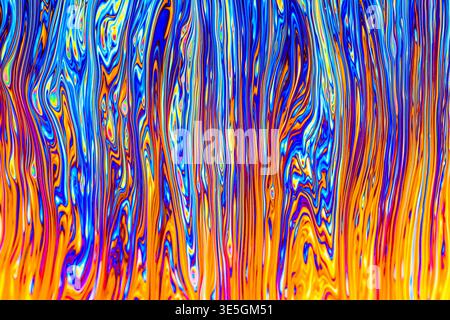 Close up on a soap bubble with random abstract forms and colors for background Stock Photo