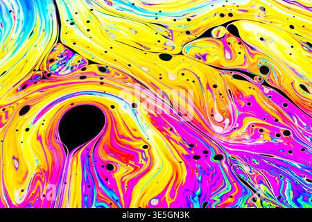 Close up on a soap bubble with random abstract forms and colors for background Stock Photo