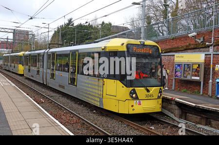 Manchester Metrolink tram at Trafford Bar stop, Old Trafford, Greater Manchester, England, UK. Stock Photo
