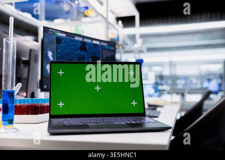 Isolated screen laptop in lab with software showing genetic markers associated with disease risk. Mockup notebook in laboratory used to study DNA strand mapping with genomics analysis program Stock Photo