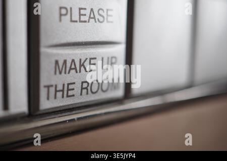 Make up the room request button in hotel Stock Photo