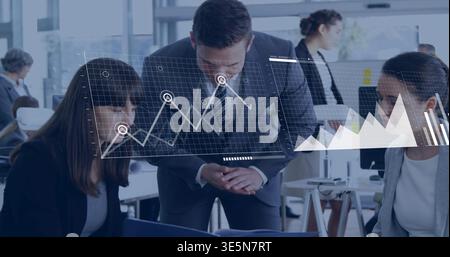 Leaning three professionals in business attire reviewing laptop data in open office with HUD charts Stock Photo